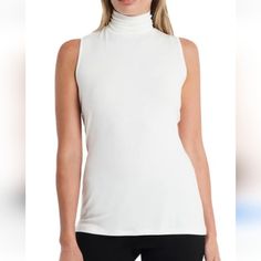 Nwt Vince Camuto White Sleeveless Turtleneck Top In New Ivory, Size L. Super Soft. Classic White Sleeveless Tank Top, Versatile White Tank Top For Layering, White High Neck Tank Top For Spring, Classic White Vest For Layering, Chic White Tank Top For Layering, White High Neck Tank Top Casual, White High Neck Stretch Tank Top, Chic White Vest For Layering, White Sleeveless Turtleneck