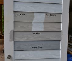 the side of a house with different siding colors and names painted on it's exterior