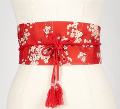 Beautiful belt in Japanese fabric on the outside and red on the inside. To wear high-waisted like an Obi. The string is long enough to cross the belt in the back and close it in front with a nice little knot. The strings end with beads. The cloth belt measures 104 cm of length and 14 cm of wide. On each side, the cordon is 70cm long. 100% cotton fabric, to hand wash to not damage the tassels. Handmade in France by Fleurs d'Ascenseurs. Now you can discover the several ways to wear my Obi belt on Obi Japanese, Magical Inspiration, Tassels Handmade, Cloth Belt, Beautiful Belts, Obi Belt, Kny Oc, Oc Ideas, Japanese Cotton