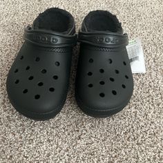 Its In Size 8 Womens. Brand Crocs. Great Condotion. They Have Not Been Worn Sense I Got Them Gifted To Me. Still Has Tag On Them. In Great Shape. Selling For 50 Classic Black Clogs With Cushioned Footbed, Black Clogs With Cushioned Footbed, Comfortable Black Clogs With Cushioned Footbed, Classic Black Synthetic Clogs, Winter Non-slip Synthetic Clogs, Casual Synthetic Clogs For Winter, Black Clogs With Cushioned Footbed And Round Toe, Comfortable Black Clogs With Round Toe, Black Closed Toe Clogs With Cushioned Footbed