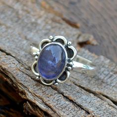 Natural Iolite Gemstone Ring -Bezel Set Designer Ring -Birthday Gift -Iolite Cabochon Ring-925 Sterling Silver Ring- Yellow Gold Iolite Ring Size/Dimension (Approx) : All Sizes Available Gemstone : Iolite Stone Shape : Oval Stone Size (Approx) : 9 x 7 mm Stone Color : Blue Please Note - Because you use good quality hand-selected gemstones Therefore, Colors and Inclusions of the Stone may Vary. I will Choose a Gorgeous Stone for You. Please Convo Us For Gemstone Customization. WHOLESALE PRICE JEW Iolite Jewelry, Iolite Stone, Ring Bezel, Zierlicher Ring, Birthday Ring, Cabochon Ring, Silver Work, Dainty Ring, March Birth Stone