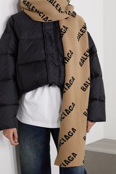 Balenciaga's logo-jacquard scarf is reworked for the season in neutral beige and black hues. Made from soft and cozy wool, it can be wrapped twice around your neck or draped around your shoulders. Luxury Jacquard Knit Winter Outerwear, Luxury Brown Scarves For Winter, Luxury Beige Scarf For Fall, Designer Wool Scarves For Winter, Luxury Black Winter Scarves, Luxury Winter Scarves, Givenchy Scarf, Pink Balenciaga, Silk Neck Scarf