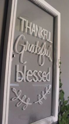 a glass sign that says, thank you grateful and blessed