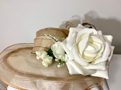 Soft bronzish gold organza church hat  is all decked out with beautiful gold, and creamy white ribbons.   There is beautiful sparkly gold loops in the center to give it a custom fancy look.  A large white rose sits in the front along with a few other roses to accentuate all the playful drama this hat showcases!   Truly unique, and I only have 2.  Enjoy! 🐎♥️👍 Luxury Cream Hat With Structured Crown, Cream Formal Hat With Structured Crown, Gold Church Hat Headpiece, Luxury Gold Hats With Structured Crown, Luxury Cream-colored Hat Headpiece, Gold Organza, Burlington Vt, Church Hat, Kentucky Derby Hat