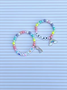 Adorable kids beaded bracelet with 6mm pastel iridescent rainbow beads with your choice of name/lettering and charm. Charms available currently are shooting star and rainbow. So cute and the charm adds such a unique look to your little one's bracelet! Makes a great gift as well- everyone loves something personalized! Please provide the following information in the personalization field: -Name/word you would like -Heart color (if any)- red, orange, yellow, green, blue, purple, pink, black or gold Personalized Rainbow Beaded Bracelets For Birthday, Personalized Rainbow Beaded Bracelets Cute Style, Personalized Rainbow Beaded Bracelets, Personalized Rainbow Beaded Bracelet For Birthday, Personalized Adjustable Rainbow Beaded Bracelets, Personalized Cute Rainbow Beaded Bracelets, Cute Personalized Rainbow Beaded Bracelets, Personalized Cute Rainbow Bracelets, Cute Personalized Rainbow Bracelets