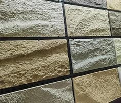 several different types of stone tiles in various colors and sizes, all lined up against each other