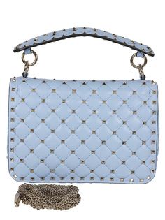 The Rockstud Spike bag by Valentino Garavani features diamond quilted leather with tone-on-tone stitching and gold-colored studs for a luxurious touch. It provides versatile carrying options for both hand-held and over-the-shoulder use, making it suitable for any occasion.

- Diamond quilted leather
- Tone-on-tone stitching
- Gold-colored studs
- Versatile carrying options
- Suitable for day or evening wear Luxury Rectangular Bags With Studs, Spike Bag, Diamond Theme, Blue Shoulder Bag, Elegant Heels, Mens Designer Shoes, Designer Products, Gorgeous Bags, Diamond Quilt