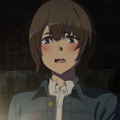 an anime character with brown hair and blue eyes looking at something in the distance while standing next to a brick wall