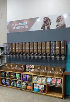 a display in a store filled with lots of food and drink bottles next to each other