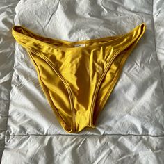 Forever 21 High Leg Bikini Bottoms Small Shiny Yellow Never Worn. New Without Tag Size Tag Still Attached Forever 21 Fitted Summer Bottoms, Forever 21 Bottoms For Beach Vacation, Fitted Forever 21 Bottoms For Vacation, High Waist Bottoms By Forever 21 For Beach, Trendy Beach Bottoms From Forever 21, Yellow Seamless Bottoms For Beach, High Waist Yellow Beachwear Bottoms, Forever 21 Stretch Swimwear For Beach Season, Summer Stretch Swimwear By Forever 21