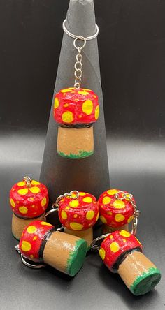 a group of small toys sitting on top of a table next to a bottle opener