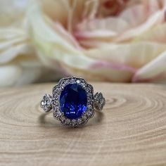 Oval Cut Blue Sapphire Engagement Ring 14k White Gold For Women Unique Vintage Halo Blue Sapphire Promise Ring, Halo Blue Sapphire Ring 6309 #OvalCut #BlueSapphireRing #14kWhiteGold #VintageRings #HaloRings #PromiseRing #BlueSapphire #UniqueRings #ForWomen #EngagementRings Classic Blue Halo Ring, Formal Blue Sapphire Ring Gia Certified, Blue Oval Gia Certified Halo Ring, Classic Blue Sapphire Diamond Ring, Gia Certified Blue Sapphire Ring, Blue Cluster Ring With Center Stone, Round Cut, Classic Blue Halo Ring With Round Cut, Classic Blue Round Cut Halo Ring, Classic Blue Halo Ring For Formal Occasions