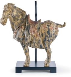 a statue of a horse on a stand