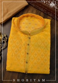 Item: Yellow with Sandalwood Pajama Detailing around the neckline and sleeves is done. No Lining. Any celebration gets sweeter when it is done in 'Desi' style! Blending the best of tradition, trend, style, ease, and comfort, our men's line comes in elegant hues that can brighten any occasion. You can wear this Kurta with the Pajama that it comes with or sport a casual Indo-Western look by pairing it over jeans! This Kurta in multiple sizes, please refer to the size chart below for actual measure Luxury Yellow Jamawar Kurta, Yellow Sherwani With Cutdana In Straight Kurta Style, Festive Mustard Straight Kurta, Straight Kurta For Diwali Rituals, Mustard Straight Kurta For Diwali, Yellow Straight Kurta For Festivals, Mustard Kurta With Zari Work For Diwali, Festival Straight Yellow Kurta, Traditional Yellow Kurta For Diwali