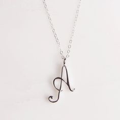 "Letter A Initial Necklace - Cursive \"A\" initial silver pendant - Personalized initial silver pendant for women / Gift for her / for mom Dainty \"A\" initial. Perfect every day necklace. Lovely gift for your self, sister, bridesmaids, new mom. Convo me if you would like to customize the length of the chain. The possibilities are endless. Pendant: Base metal is brass and 16K gold plated. Chain is 18 inches, sterling silver. (if you would like a longer or shorter chain, please contact us to cust Sterling Silver Initial Pendant Charm Necklace For Mom, Mother's Day Silver Initial Pendant Necklace, Elegant Silver Initial Necklace With Monogram, Elegant Silver Monogram Initial Necklace, Silver Initial Pendant Necklace For Mom, Mother's Day Sterling Silver Monogram Charm Necklaces, Personalized Silver Charm Necklaces With Initials, Sterling Silver Monogram Charm Necklace For Mother's Day, Silver Monogram Charm Necklace For Mother's Day