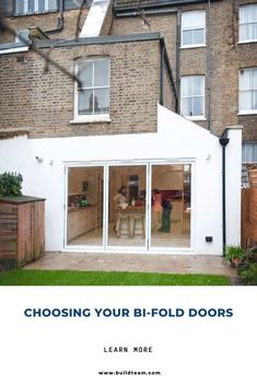 an advertisement with the words choosing your bi - fold doors in front of a brick building