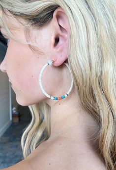 Add a subtle pop of color to your look with the Shore Meetup Disc Hoop Earrings. Medium size hoop with a pearl detail, reign discs and gold beads. This will become your go to summer accessory! Snap closure Approx. 2" Hoop Earrings Medium, Affordable Jewelry, Summer Accessories, Gold Beads, Reign, Medium Size, Color Pop, Hoop Earrings, Beads