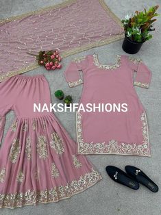 *Fabric Detail*  Top *Top Fabric *         :Heavy Faux Georgette With *Embroidery Sequence Work with Sleeve and Heavy Lace Work* *Top Inner*  :Heavy Micro Cotton  *Top Length*       : 36-38 *Top Size*.            : XL(42) *(Fully Stitched Complete Ready To Wear)*  Sharara  Sharara Fabrics* :Heavy Faux Georgette With Heavy Embroidery Sequence Work   Sharara Length*:40-41 Inch  (fully stitched)* Dupatta*  Dupatta Fabric * :Heavy Faux Georgette With *Heavy Embroidery Sequence Work With Lace Border* Fitted Dresses With Handwork, Party Sets With Fitted Resham Embroidery, Fitted Resham Embroidery Sets For Party Season, Fitted Sets With Resham Embroidery For Party Season, Embroidered Sets For Party, Embroidered Sets For Party Season, Embroidered Party Sets For Party Season, Embroidered Party Sets, Pink Handwork Party Sets