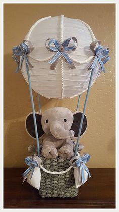 Baby Shower Gift Ideas - Yes, I Want It! Isn't that what you are looking for? Visit now for more ideas. Theme Bapteme, Elephant Centerpieces, Boy Baby Shower Centerpieces, Elephant Baby Shower Decorations, Elephant Baby Shower Boy, Idee Babyshower, Baby Shower Baskets, Elephant Baby Shower Theme, Elephant Shower