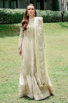 Brand: SAAD SHAIKHProduct Code: IVORY BREEZECollection: Saad Shaikh Fleurie Luxury CollectionFabric: Organza DESIGN DETAILS: Embroidred Shirt with Hand Embellished on OrganzaRaw Silk Trouser with Embroidered Bell BottomZari Net Dupatta with Four Side Embroidered Border DISCLAIMER:* Lining, Laces, and Tassels are not included in unstitched variants.* Embellishment items in stitched outfits are subject to market availability.* Product color may vary due to photographic lighting or your device sett Organza Suit, Maxi Frocks, Simple Maxi, Organza Suits, Luxury Pret, Eid Outfit, Embroidered Organza, Embroidered Border, Pakistani Wedding Dresses