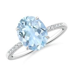 ANGARA Product_Description:- This oval aquamarine ring in 14K Solid Gold has a sleek and elegant look. The mesmerizing pastel-blue gemstone is secured in a claw setting. Diamonds are encrusted on the thin shank to add a hint of brilliance to the ring. # Features:- 2.2 ct Aquamarine and 0.14 ct Diamond. Crafted in 14K Solid Gold. We offer high-quality gemstone jewelry in a variety of stunning designs. The exceptional craftsmanship ensures that every piece lasts for generations. All gemstones are sourced directly from mines and manufacturers. # About the Gemstone:- Aquamarine exudes a soothing charm that captivates from the very first glance. This icy blue gem symbolizes peace, clarity, hope and balance, and is the official birthstone for March. Plus, it holds a special place as the traditio Oval Aquamarine Ring, Gold Sign, Claw Setting, Aquamarine Ring, Aquamarine Rings, Blue Gems, Blue Gemstones, March Birth Stone, Pastel Blue