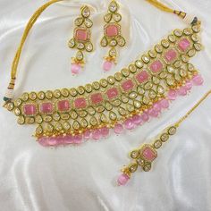 ✰ traditional Necklace set ✰ PLATING: Gold Finish ✰ SIZE : Free ✰ PACKING: Necklace Set ✰ Includes Matching Earrings / Maang Tikka ✰ We provide untracked FREE PARCEL DELIVERY in CANADA & USA on orders below $80. However, If you require Tracking information, please choose delivery upgrades while checkout. ✰ Products that are heavier and below $80 are delivered using STANDARD PARCEL for half the actual delivery price. ✰ We provide STANDARD FREE PARCEL DELIVERY IN CANADA & USA on all orders above $ Luxury Pink Temple Jewelry Necklaces, Luxury Pink Kundan Necklace For Wedding, Traditional Necklace, Parcel Delivery, Maang Tikka, Luxury Collection, Wedding Jewellery Necklace, Original Jewelry, Traditional Jewelry