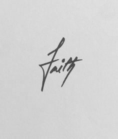 a piece of paper with the word faith written in cursive writing on it