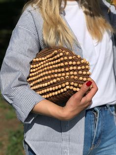 HANDMADE RAFFİA CLUTCH BAG Inspired by nature sustainable fashion ✅Any woman must have this bag for every fashionista.Whether you keeping it to yourself or gifting someone you care, it will be unforgettable. Daily use, a fashionable women's accessory for special occasions ✅I made this beautiful clutch from natural raffia yarn and bead. ✅The interior of the straw summer bag is fully lined with cotton and has a hidden metal lock. A lining of the appropriate color is sewn into the crochet raffia ba Natural Beaded Shoulder Bag For Summer, Summer Beaded Natural Shoulder Bag, Natural Color Summer Shoulder Bag Clutch, Natural Color Summer Shoulder Clutch, Natural Beaded Bags For Summer, Bohemian Beaded Crochet Bag In Natural Color, Summer Beaded Natural Bags, Bohemian Beaded Natural Color Bag, Summer Beaded Clutch Bag