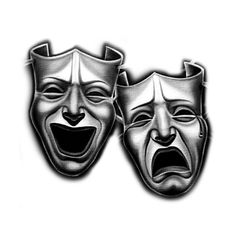 two masks that have faces with mouths open