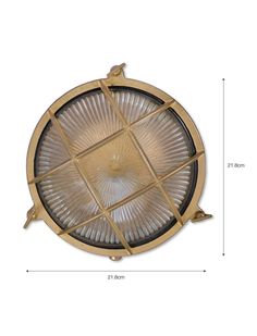 an image of a round light fixture on a white background with measurements for the size