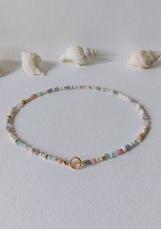 Gemstone bead necklace with colorful gemstones 6 mm: jade, cherry quartz, aventurine,aquamarine, sunstone, aquachalcedony, rose quartz beads. Freshwater pearls 6 and 3 mm. The lobster clasp, the intermediate beads are gold plated, as is the chain. The chain is 42 cm, to be extended to 46 cm.  The 14 carat gold filling is about 100 times thicker than simple gold plating. The gold layer is mechanically bonded to the base material brass.  Small inclusions, color deviations and irregularities on the Pretty Simple Jewelry, Layered Bead Necklaces, Pastel Gemstone Beads Jewelry For Gifts, Pastel Jewelry With Colorful Beads As Gift, Pastel Jewelry With Colorful Beads For Gifts, Punk Jewelry Diy, Simple Beaded Necklaces, Ethereal Jewelry, Beaded Chain Necklace