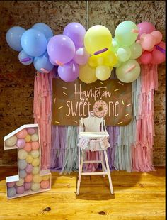 a birthday party with balloons and decorations