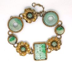 Lady's vintage jade and gold plated sterling bracelet. Beautiful and artsy bracelet with alternating links featuring what appears to be different cuts and types of jade. This piece weighs approximately 30.8 grams. It is in great condition and would make a beautiful addition to your vintage jewelry collection. Jade Bracelet Aesthetic, Verde Jade, Antique Costume Jewelry, Sterling Bracelets, Jade Bracelet, Jade Carving, Unique Bracelets, Wedding Jewelry Bracelets, Wedding Bracelet