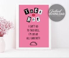 a pink poster with the words taco bar written in black on it next to a white vase