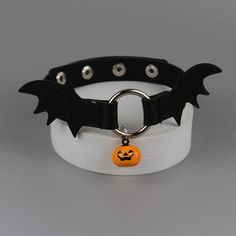 Material: PU Alloy Color: Black Pendant: Small Pumpkin, Big Pumpkin Size: Small pumpkin bell: 1.6-2.1cm Big pumpkin bell: 3cm Length: 39cm Width: 1.8cm Adjustable circumstance: 30-38cm Disease Art, Fictional Disease Art, Harajuku Fashion Kawaii, Goth Skirts, Big Pumpkin, Creepy Cute Fashion, Emo Accessories, Biggest Pumpkin, Scene Goth