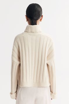 Ribbed knit turtleneck sweater in 100% cashmere. - Rib knit - Regular fit - True to size - 3 gg - 7 ply - 100% Cashmere Model is wearing size S and is 177 cm tall. Ribbed Cashmere Turtleneck For Work, Ribbed Cashmere Turtleneck For Fall, Ribbed Cashmere Sweater With Funnel Neck, Workwear Ribbed Cashmere Turtleneck, Fall Ribbed Cashmere Turtleneck, Cashmere Funnel Neck Polo Sweater, Cable Knit Turtleneck Polo Sweater, Cozy Cashmere Turtleneck With Soft Knit, Cashmere Turtleneck Polo Sweater