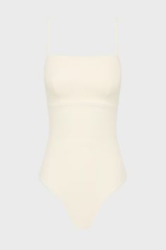 The Aerin One Piece in Pearl is an elegant, contemporary swimsuit with a flattering square neckline. With a bust panel, hidden under-bust support and removable cups, Aerin is supremely flattering to a woman's figure. Cut from our technically advanced Sculpteur® fabric with 3-D stretch, Aerin will support the bust and streamline the body. A chic swimsuit that idea for larger busts, suiting cup sizes B to DD. Luxury fabric sustainably made in Italy. Summer Swimwear With Built-in Bra And Straight Neckline, White Square Neck Swimwear For Beach, Elegant Smoothing Summer Bodysuit, Elegant Smoothing Bodysuit For Summer, Chic White Second-skin Swimwear, Elegant Summer Smoothing Bodysuit, Elegant Square Neck Stretch Swimwear, Elegant Square Neck Bodysuit, White Square Neck Swimwear For Swimming