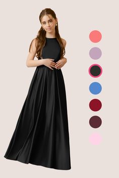 a woman in a long black dress standing next to color swatches and the image shows her