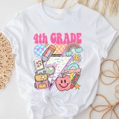 PLEASE READ ENTIRE DESCRIPTION BEFORE ORDERING Unisex Fit Fourth Grade Shirt, 4th Grade Shirt, 4th Grade Team, Cute 4th grade tee, Hello 4th grade, Back to school shirts, First Day Fall in love with this soft and cozy Graphic Tee, Sweatshirt or hoodie  TO MAKE YOUR SHOPPING EXPERIENCE EASIER, YOU CAN "CHOOSE" A T SHIRT, SWEATSHIRT OR HOODIE IN THIS LISTING. Size up 1-2 sizes for a slouchy oversized fit PINK, Sand and light blue are NOT available in a 4X 5X Sweatshirt but they ARE  available in T 4th Grade Shirts For Kids, Multicolor Letter Print T-shirt For School Events, Back To School T-shirt With Heat Transfer Vinyl, White T-shirt With Funny Print For Back To School, Fun T-shirt For End Of School Year, Pink T-shirt For End Of School Year, Fun T-shirt For College End Of School Year, Multicolor Funny Print T-shirt For School, Multicolor Letter Print Tops For School Events