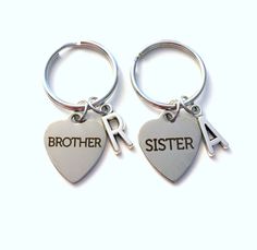 Sibling Keychain, Brother Sister Key Chain Set of 2 3 4 5 6 7 8, Gift for Bridal Party Present Keyring Silver Initial Personalized her ITEM DESCRIPTION: Each key chain will include: (you pick the number of key chains you want 1- 12)  a laser engraved stainless steel charm: size:  3/4" x 7/8"       You can pick Brother or Sister engraved (please see picture for only choices available)  - an initial charm of your choice (please leave me a message with what initial you want with each sibling) - an Presents For Best Friends, Planner Charms, Presents For Friends, Birthstone Charms, Organza Gift Bags, Brother Sister, Initial Charm, Tiffany Heart, Heart Charm Bracelet