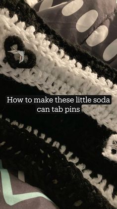 there is a black and white polka dot pillow on top of a bed with the words how to make these little soda can tab pins