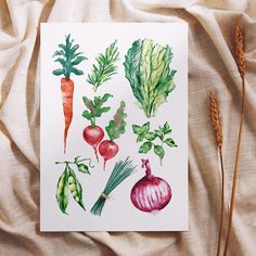 a painting of vegetables on a sheet of paper next to some stalks of wheat and carrots