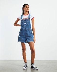 Levi's Classic Vintage Shortalls. This versatile piece features a relaxed fit. Pair this with your favorite t-shirt underneath & white sneakers to complete the look. Our model is wearing a size small. She is 175cm tall with a 80cm bust, a 60cm waist and 88cm hips. Levi Short Overalls, Short Overalls, Levi Shorts, Denim Overalls, Classic Vintage, White Sneakers, Overall Shorts, The Vintage, Levi's