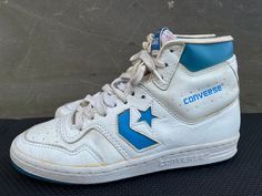 Rare Vintage 1980s Converse All Star High Top Basketball Made Yugoslavia US 7.5 Awesome shoes minor scuffs, check photos for clear visual description. PLEASE VIEW ALL PHOTOS CAREFULLY AS I CONSIDER THEM PART OF THE DESCRIPTION. I WILL GLADLY COMBINE SHIPPING FOR MULTIPLE ITEMS PURCHASED IF THEY CAN BE SAFELY SHIPPED TOGETHER. DELIVERY WITHIN 5 BUSINESS DAYS, 1-2 DAYS HANDLING ONCE YOUR PAYMENT CLEARS, THIS ITEM WILL COME PROFESSIONALLY PACKAGED AND SHIPPED WITH CARE. PLEASE CONTACT ME THROUGH ME Vintage High Top Sneakers, 1980s Converse, Converse Basketball Shoes, Converse All Star High, Awesome Shoes, Sneakers Athletic, Retro Sneakers, Dream Shoes, Converse All Star