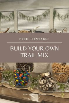 the build your own trail mix is displayed on a table with text overlay that reads free printable