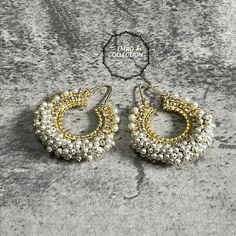 We are thrilled to introduce our exquisite collection of Pearls chand bali earrings. These beautiful chand bali earrings are crafted to enhance your style, whether you're attending a party or a wedding ceremony. They are guaranteed to make you stand out in the crowd.Elevate your style with these stunning bali Earrings. Make a bold fashion statement and turn heads wherever you go. Shop our stunning collection today!We have a wide range of colors available, so be sure to check our other listings to find the perfect match for your style.In addition to this earring, we have a wide variety of Indian Pakistani jewelry. Explore our shop to discover the perfect piece for your collection. If you're having trouble viewing our photos, try increasing your screen brightness for a clearer image.We aim t Chand Bali Earrings, Chand Bali, Pakistani Jewellery, Pakistani Earrings, Maroon Colour, Bali Earrings, Chandbali Earrings, Pakistani Jewelry, Earrings Hoop