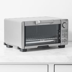 a toaster oven sitting on top of a counter