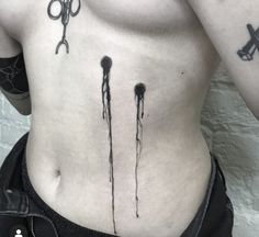 a person with scissors on their stomach