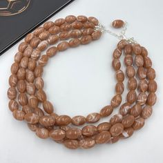 This beautiful Cacao Brown Statement Necklace is completely handmade with high quality. It can be worn with everything and everywhere, at a holiday party or after work with friends! This is a handcrafted necklace, uniquely designed with attention to every detail. Necklace length is 16.5" shortest strand plus additional 3 inch extender chain for length adjustment. Matching earrings are BONUS! Made of brown acrylic marble effect egg shape beads 18mm. - silver plated finding - clasp is platinum pla Short Layer, Long Layer, Brown Acrylic, Autumn Necklace, Thoughtful Gifts For Her, Chunky Statement Necklace, Bold Necklace, Christmas Necklace, Brown Necklace