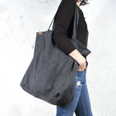 Lazy Bag is an over sized city type bag. Its simple and elegant design make it a faithful companion throughout the entire day. The bag was made using a durable cotton, resistant to wear and friction. It's also ecologically friendly and does not cause allergies. Slightly worn through (aged) texture of the fabric gives it a unique look. Lazy bag was created from a crease resistant cotton. The bag softly and freely shapes around the arm.FEATURES:handmade in Europefully zipped upinside pocket for mo Extra Large Beach Bag, Lazy Bag, Large Beach Bag, Blue Linen Dress, Large Beach Bags, Slouchy Tote, Everyday Tote Bag, Soft Leather Bag, Haikou